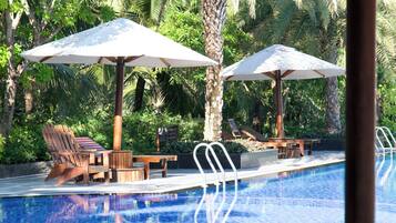Outdoor pool, open 6:00 AM to 6:00 PM, pool umbrellas, pool loungers