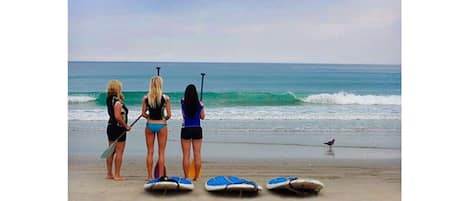 On the beach, sun loungers, beach towels
