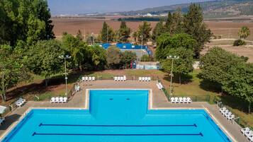 Seasonal outdoor pool, pool umbrellas, sun loungers