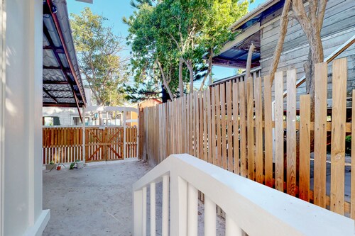 Two open, tropical studios w/ WiFi, partial AC & great location near the beach