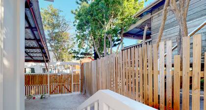 Two open, tropical studios w/ WiFi, partial AC & great location near the beach