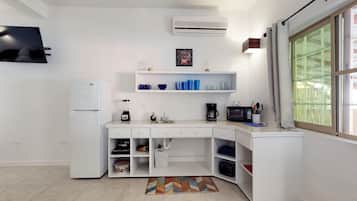 Fridge, microwave, coffee/tea maker, toaster
