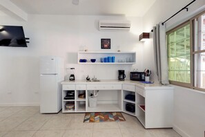 Fridge, microwave, coffee/tea maker, toaster