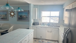 Coffee/tea maker, fridge, microwave, oven