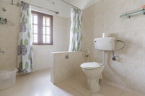 Hair dryer, towels, shampoo, toilet paper