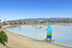 On the beach, sun-loungers, beach towels - Bay Front Luxury Penthouse w/elev. & AC! Enjoy multiple outside patios & views! (San Diego)