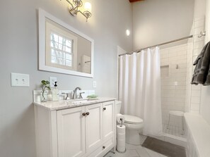 Combined shower/bathtub, hair dryer, towels, soap