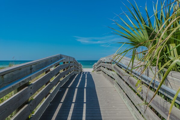 On the beach, sun-loungers, beach towels