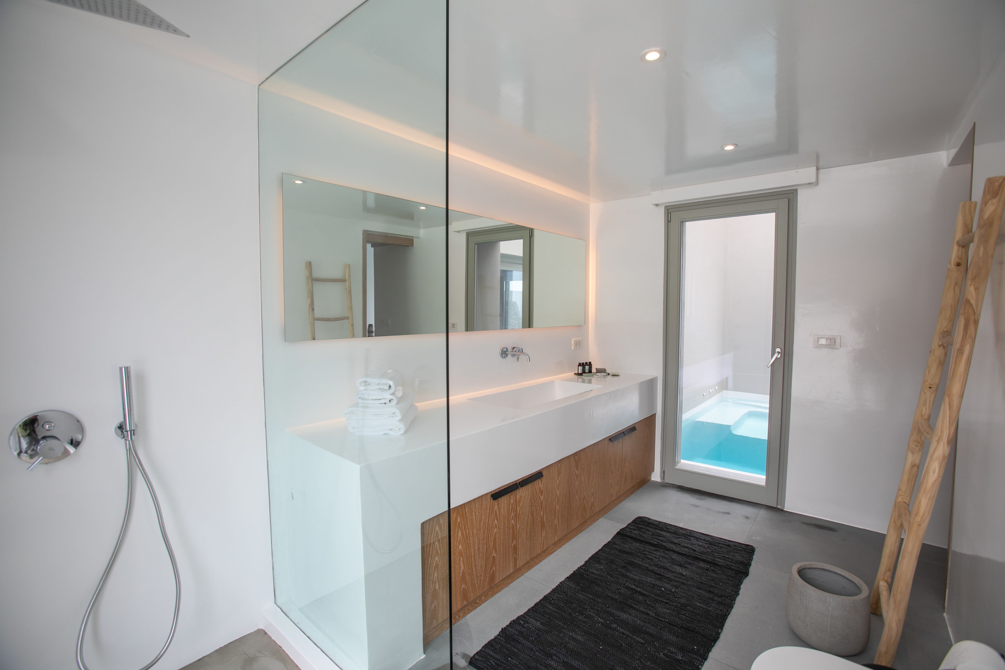 melidonia villa with caldera view and private pool | bathroom shower