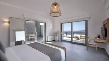 Superior Suite with Loft with Caldera View and Private Pool | Minibar, in-room safe, individually decorated, desk