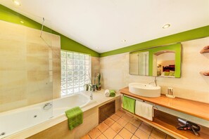 Bathtub, hair dryer, towels