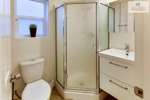 Bathtub, hair dryer, towels