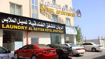 A hotel with a sign indicating a laundry service.