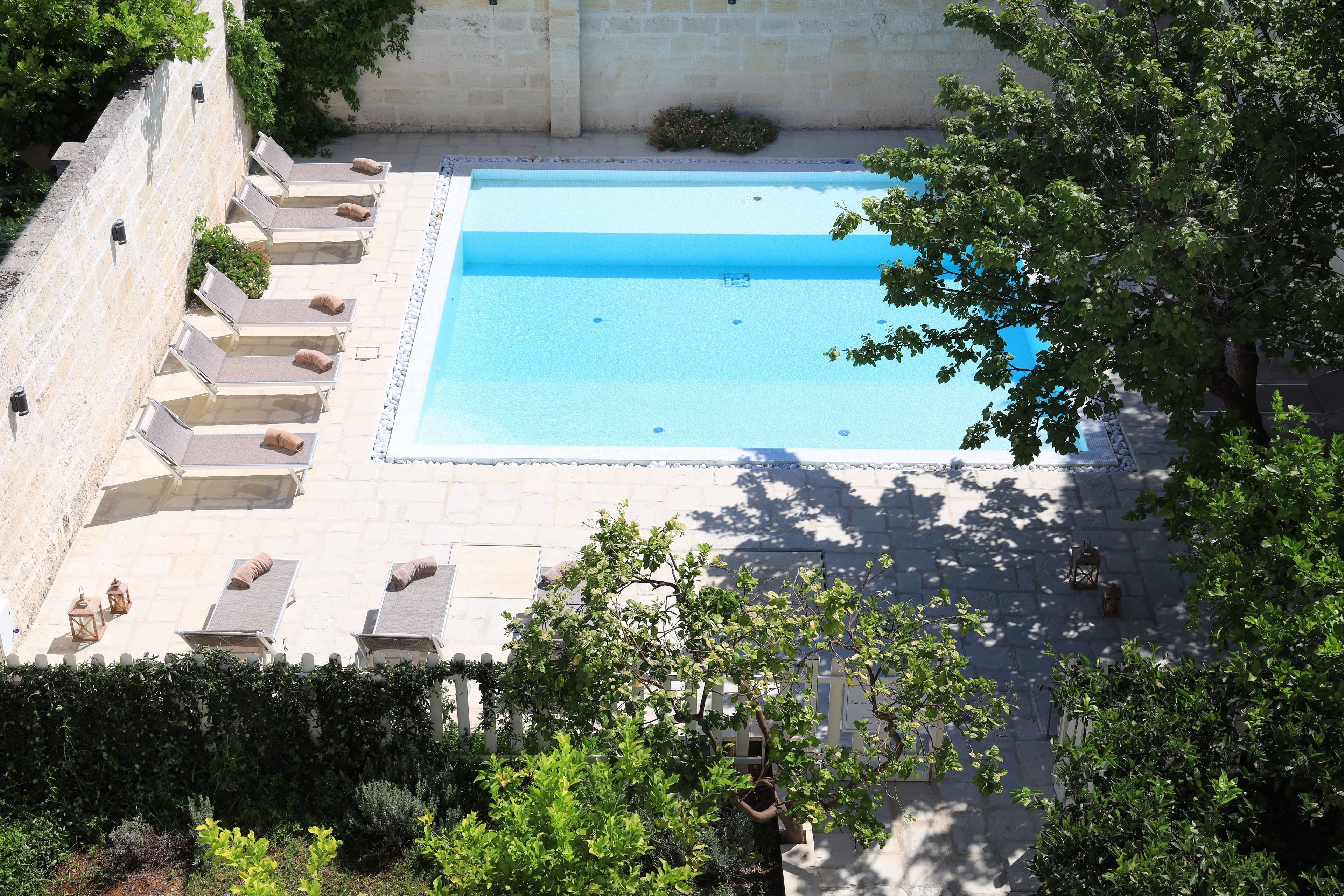 Outdoor pool, pool umbrellas, pool loungers