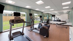 A gym with treadmills, elliptical machines, and weight equipment. - Holiday Inn Express Lake Park by IHG (Lake Park)