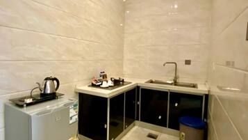 Mini-fridge, microwave, electric kettle
