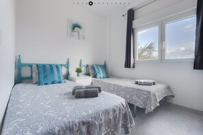 Standard Apartment, 2 Bedrooms, Pool Access, Beachside | Hypo-allergenic bedding, blackout drapes, iron/ironing board, free WiFi