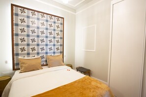 1 bedroom, desk, iron/ironing board, travel cot