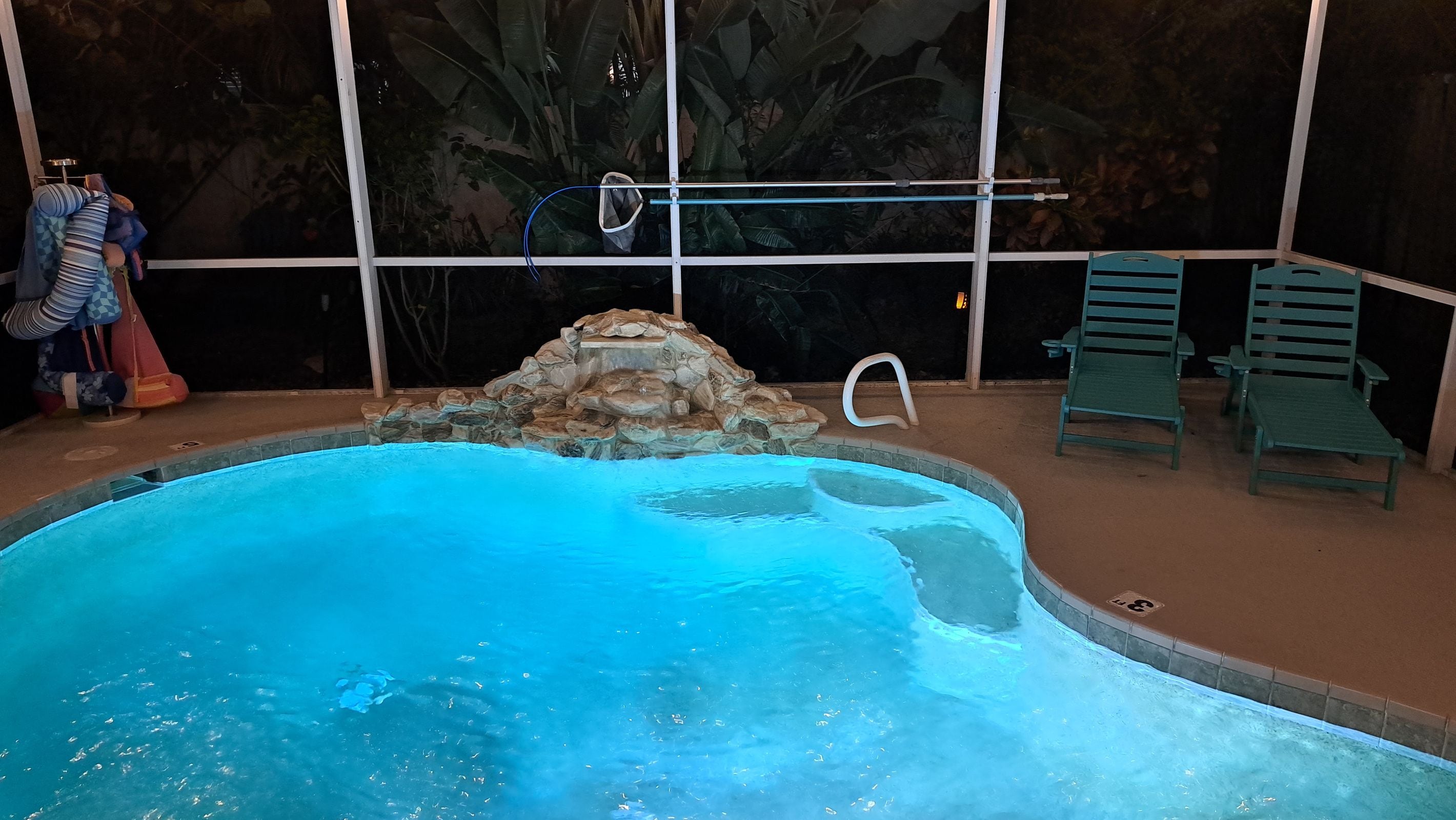 Cool off in the pool with waterfall the moment you arrive.