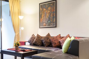 2-Bedroom Comfort Apartment | Living area | Flat-screen TV - Bangtao Beach Garden by Rents In Phuket (Choeng Thale)