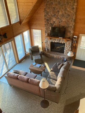 Smart TV, fireplace, DVD player, books