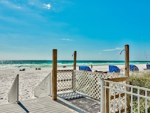 On the beach, sun-loungers