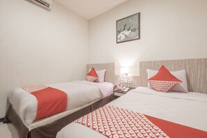Standard Suite, 2 Twin Beds | Free WiFi, bed sheets - Hotel Agraha Makassar (Makassar)