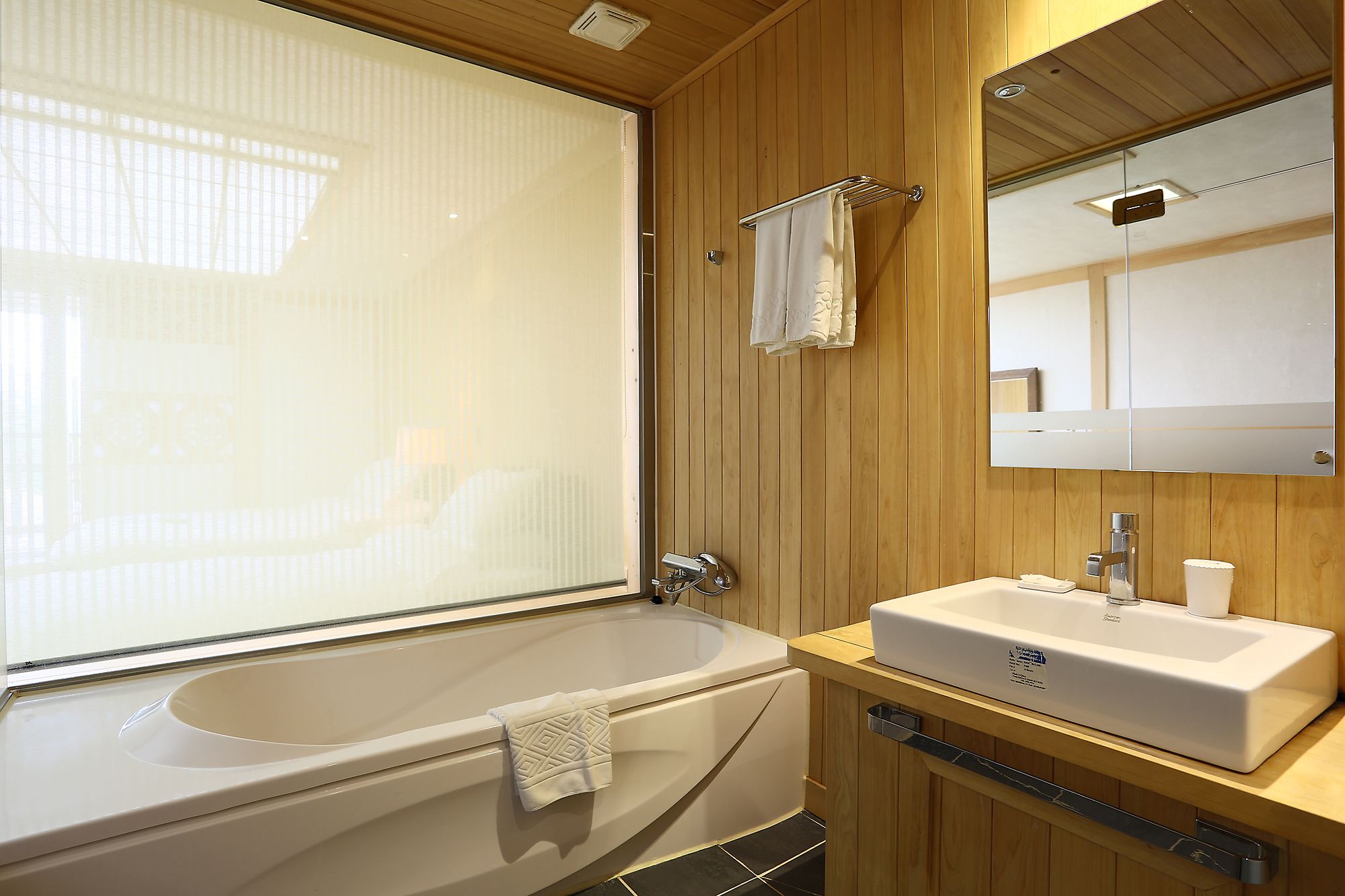 suite, kitchenette (free nature park) | bathroom | separate bathtub and shower, free toiletries, hair dryer, towels