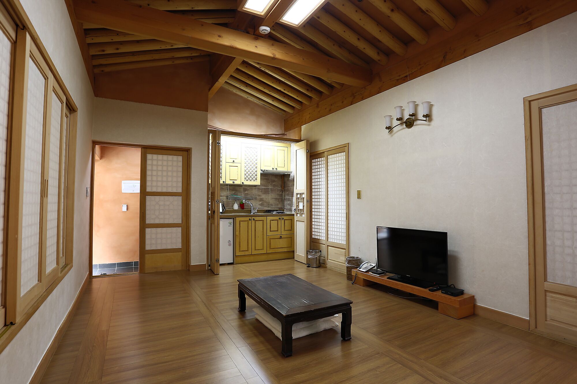 suite, kitchenette (free nature park) | living area | flat-screen tv, heated floors