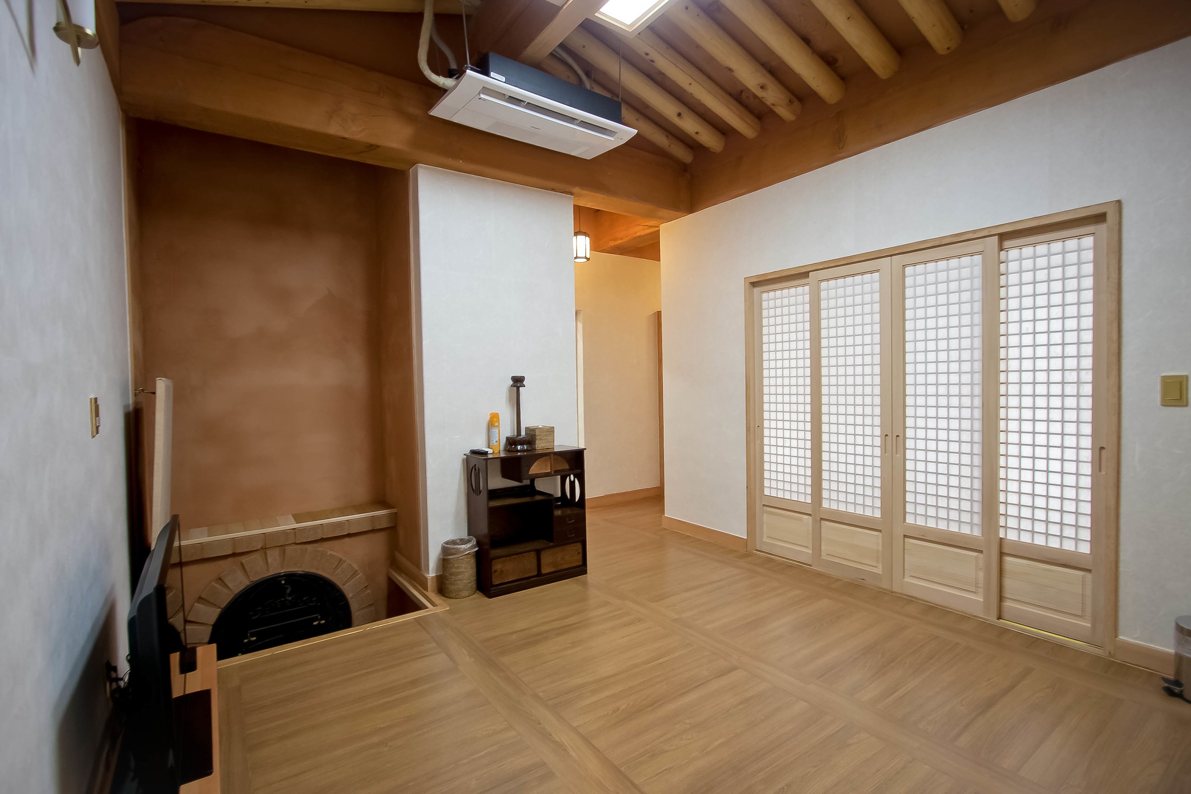 suite, kitchenette (free nature park) | living area | flat-screen tv, heated floors