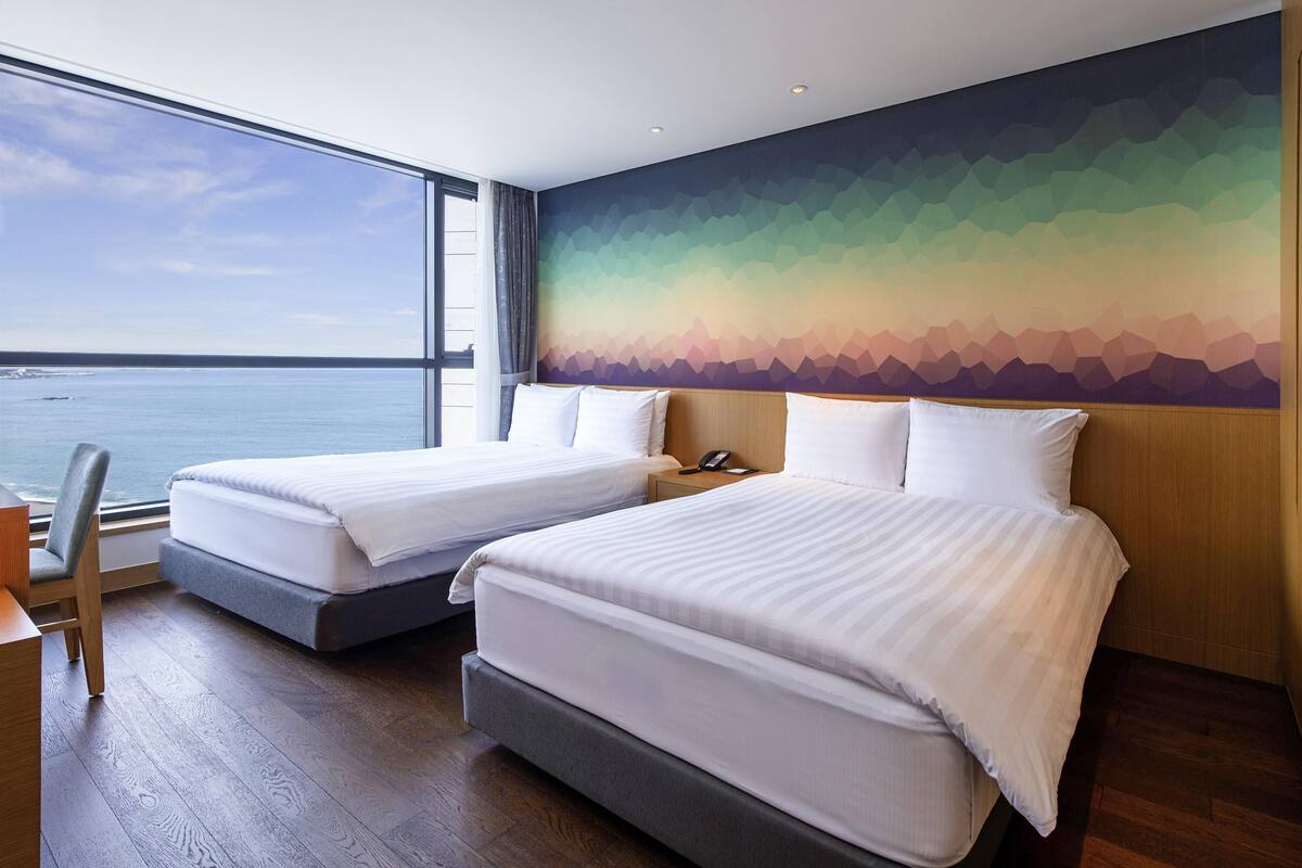 Superior Suite, Multiple Beds, Partial Ocean View | Premium bedding, in-room safe, desk, laptop workspace