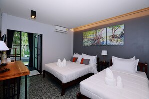 Family Triple Room | Minibar, blackout curtains, free WiFi, bed sheets