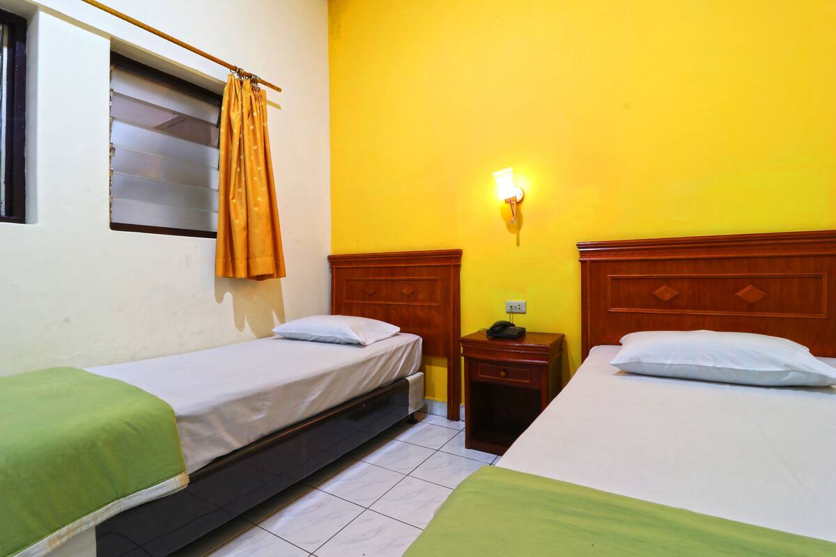 Desk, laptop workspace, free WiFi, bed sheets