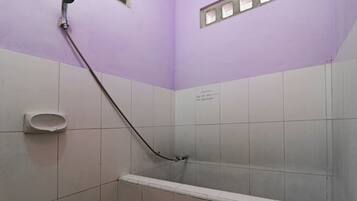 Economy Fan Room | Bathroom | Shower, free toiletries, towels