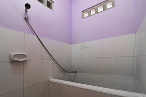 Economy Fan Room | Bathroom | Shower, free toiletries, towels - Hotel Melati (Medan)