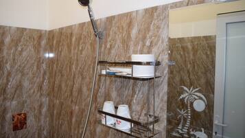 Single Room | Bathroom | Shower, free toiletries, hair dryer, slippers