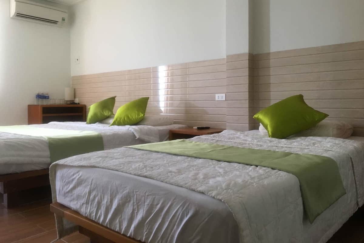 Phòng đơn Deluxe, nhiều giường, quang cảnh bãi biển | Phòng khách