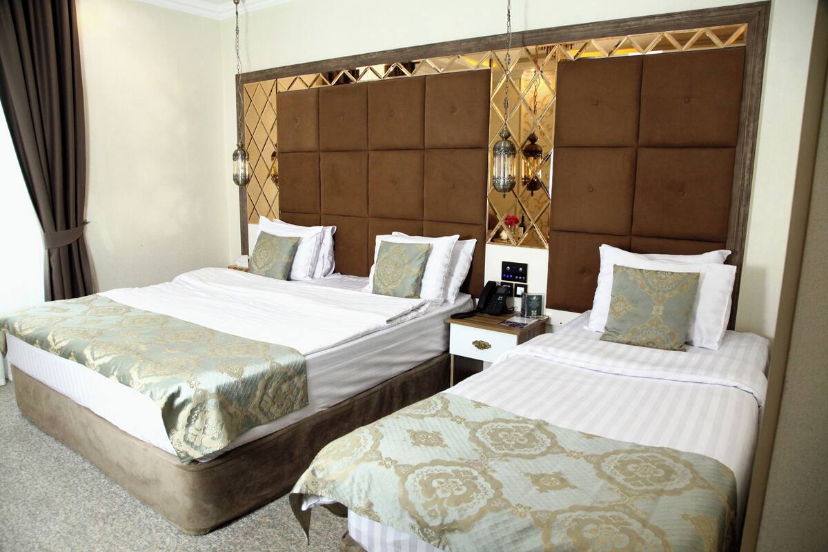 Deluxe Triple Room | Premium bedding, pillowtop beds, minibar, in-room safe