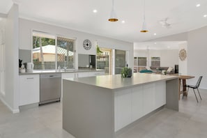 Deluxe House, 4 Bedrooms, Pool View | Private kitchen | Full-sized fridge, microwave, oven, stovetop - Experience a Luxurious and Private Getaway (Noosaville)
