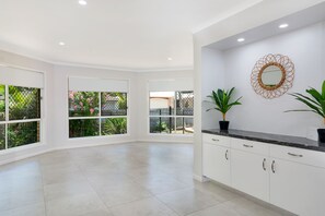 Deluxe House, 4 Bedrooms, Pool View | Living area | LCD TV - Experience a Luxurious and Private Getaway (Noosaville)