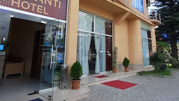 A hotel with a sign reading "Eleganti Hotel". - Eleganti (Batumi)