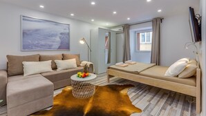 Apartment, Ground Floor (Small, sweet & cosy 1) | Living area | Flat-screen TV - Apartments Small Sweet & Cosy (Rijeka)