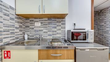 Apartment, Ground Floor (Small, sweet & cosy 1) | Private kitchenette | Fridge, microwave, stovetop, electric kettle