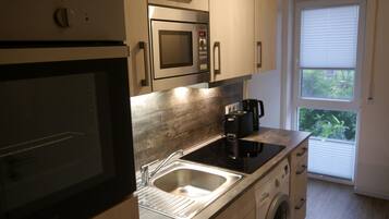 Minibar, Verdunkelungsvorhänge, kostenloses WLAN, Bettwäsche