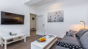 City Apartment, 2 Bedrooms | Living area | Flat-screen TV