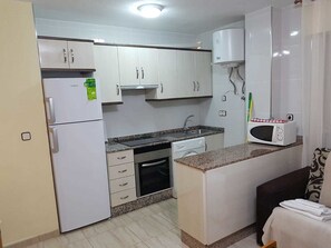 Apartment, 1 Bedroom | Private kitchen | Stovetop, coffee/tea maker, cookware/dishes/utensils - Apartamentos Olympia Center (Cartagena)