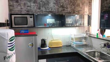 Apartment | Private kitchen | Fridge, microwave, oven, stovetop