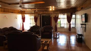 House | Living room | 30-inch TV with cable channels