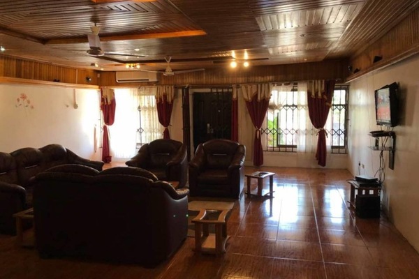 House | Living room | 30-inch TV with cable channels