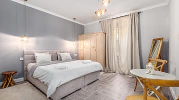 1 habitación, sistema de insonorización y tabla de planchar con plancha